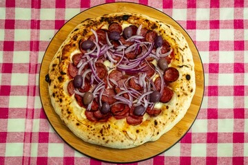 Traditional Brazilian Calabrian sausage pizza. Brazilian food, real food