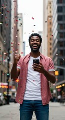 Photo of Celebrating Man With Phone in City Under Confetti Rain