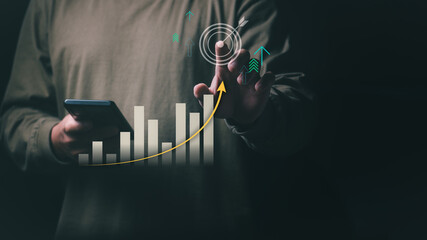 Businessman or trader showing business growth, investing in stock market or digital assets trading,...