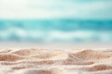 Golden sand dunes meet the turquoise sea in a serene beach landscape