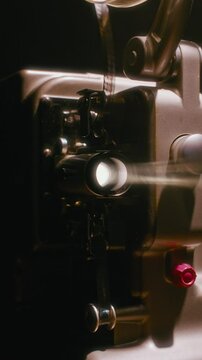 Film Projection Light From Bolex M8 Lens In Dimly Lit Room