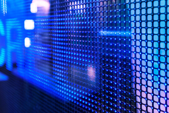 LED display technology displays color image information on large wall areas in interior design. - Powered by Adobe