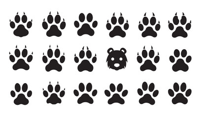 Fototapeta premium Collection of stylized black paw prints and bear face for animal related design