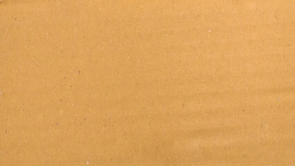 Background of brown kraft paper or cardboard texture. Brown recycled paper texture background.