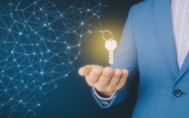 Businessman holds key, network background