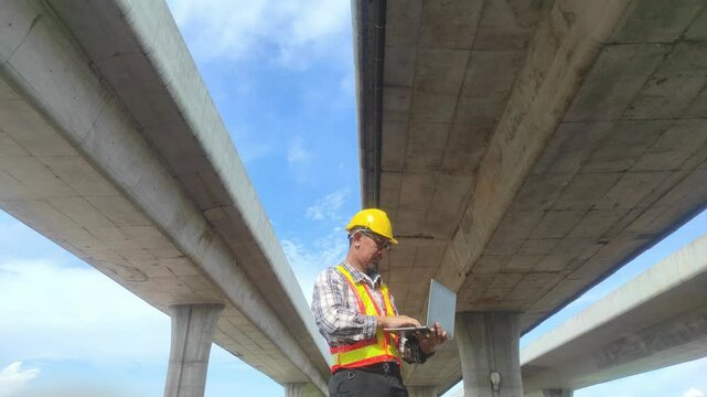 Engineering inspection: An engineer, hardhat in place, meticulously examines structural integrity, using advanced technology and expertise to ensure safety and quality.