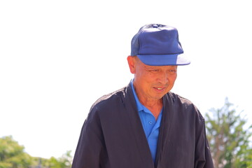 微笑むシニアおじさん