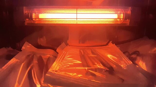 a doctors and dentist tools are sterilized inside of a sterilisation oven