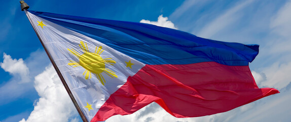 Strong Philippine Flag Flying against blue sky