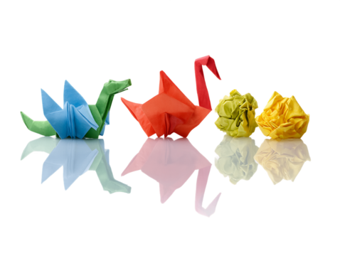 Colorful Origami Animals and Crumpled Paper Balls on Reflective Surface, PNG - Powered by Adobe