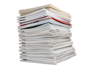 A tall stack of papers and documents with a red folder visible in the middle of the pile sitting still