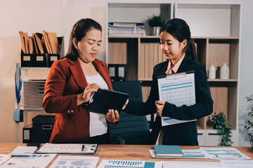Business meeting time. Business man and business woman working on startup project.