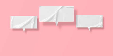 White crumpled speech bubble paper isolated on pink background