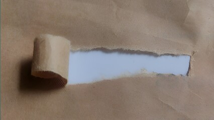 Torn Paper revealed White Space Behind Kraft Paper