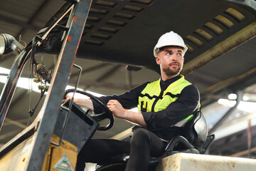 Drive forklift : Caucasian man staff driving forklift in industrial container warehouse....