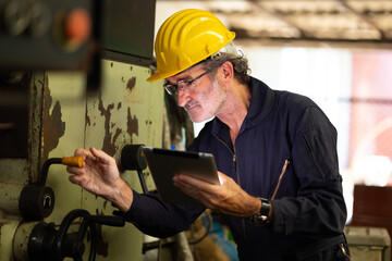 engineering man working : Manufacture technical and factory senior caucasian staff working on machine at industry factory. Professional Mechanical Engineer