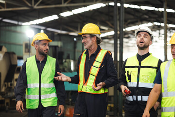 Professional team working at workplace. Unity and teamwork concept. Group portrait engineer factory manager worker and mechanic team together in factory workplace