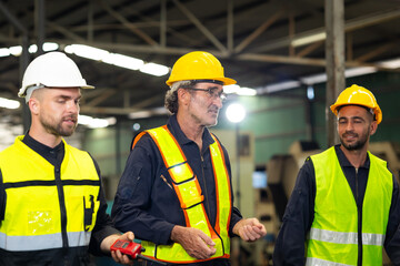 Professional team working at workplace. Unity and teamwork concept. Group portrait engineer factory manager worker and mechanic team together in factory workplace