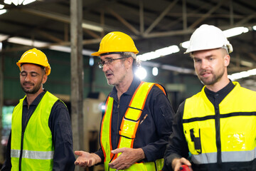 Professional team working at workplace. Unity and teamwork concept. Group portrait engineer factory...
