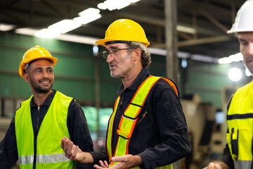 Professional team working at workplace. Unity and teamwork concept. Group portrait engineer factory manager worker and mechanic team together in factory workplace