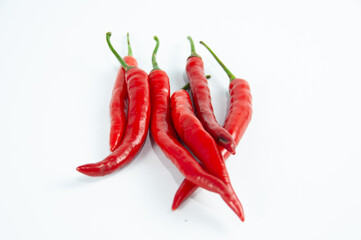 Group of Red chilli peppers isolated on white
