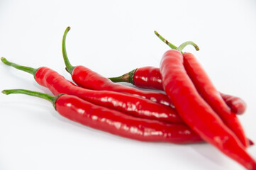 Group of chilli peppers isolated on white