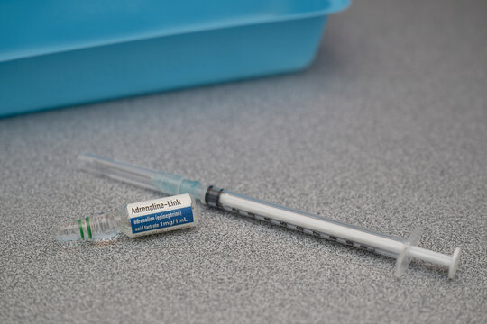 Adrenaline Epinephrine ampoule and needle syringe, emergency drug medication for anaphylaxis and shock, doctor clinic supply, Queensland Australia