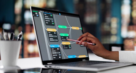 African American Female Engineer Using Realtime 3D Node Editor