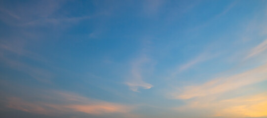 the sky has light orange clouds