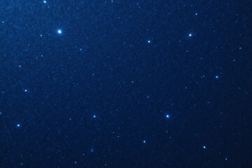 Fototapeta premium blue background with stars in the night sky
