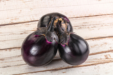Raw violet and black eggplant
