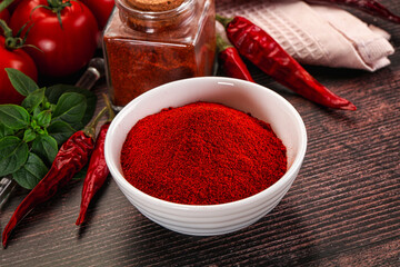 Spicy dry paprika powder in the bowl