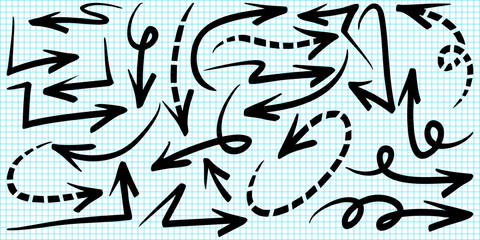 set of hand drawn doodle arrows in various styles on a blue grid paper background. 