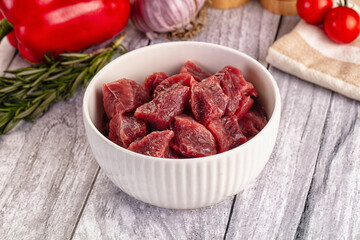 Raw beef meat cubes pieces