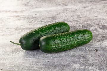 Ripe green raw two cucumbers