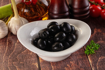 Mediterranean marinated Black olives in the bowl