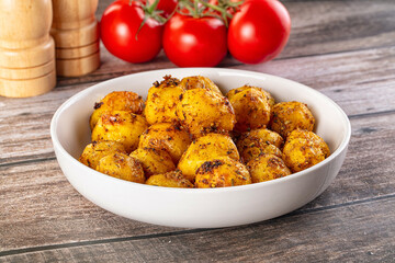 Baked small baby potato with herbs