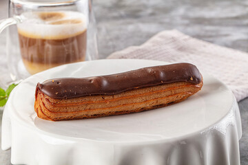 Gourmet chocolate eclair with icing