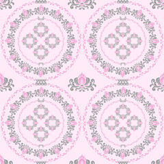 Seamless decorative pattern with pink ang gray damask floral ornaments on pink background.