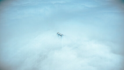 DJI Mavic 2 Pro HD aerial photography of Dalian Xinghai Bay Bridge under clouds and fog, Dalian, a second-tier city in Liaoning, China
