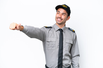 Young safeguard man over isolated white background giving a thumbs up gesture