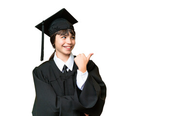 Little university girl over isolated background pointing to the side to present a product