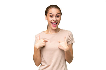 Young caucasian woman over isolated background with surprise facial expression