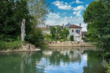 Fototapeta premium Crecy-la-Chapelle, in France, the canal .