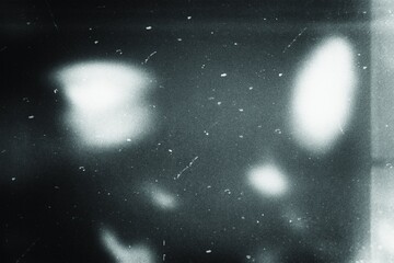 Distressed film grain texture, lens flare effect, light leaks overlay effect, abstract aged scratched dusty film grain with heavy noise and grain, grunge texture, digital noise background