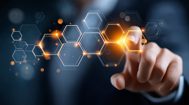 Interactive Digital Interface: A close-up shot shows a hand reaching out to touch a digital interface, where golden glowing hexagons are connected and interact in a network of interconnected ideas.