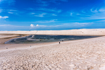 Dunes and lagoons of lagoa bonita, Lencois Maranhenses, Barreirinhas, Brazil. White sand dunes with pools of fresh water