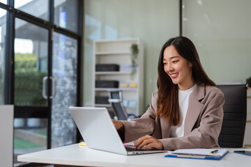Business women are calculating daily expenses.
