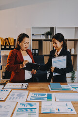 Business meeting time. Business man and business woman working on startup project.