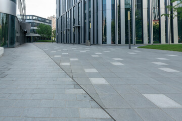empty road in front of modern office building in the city